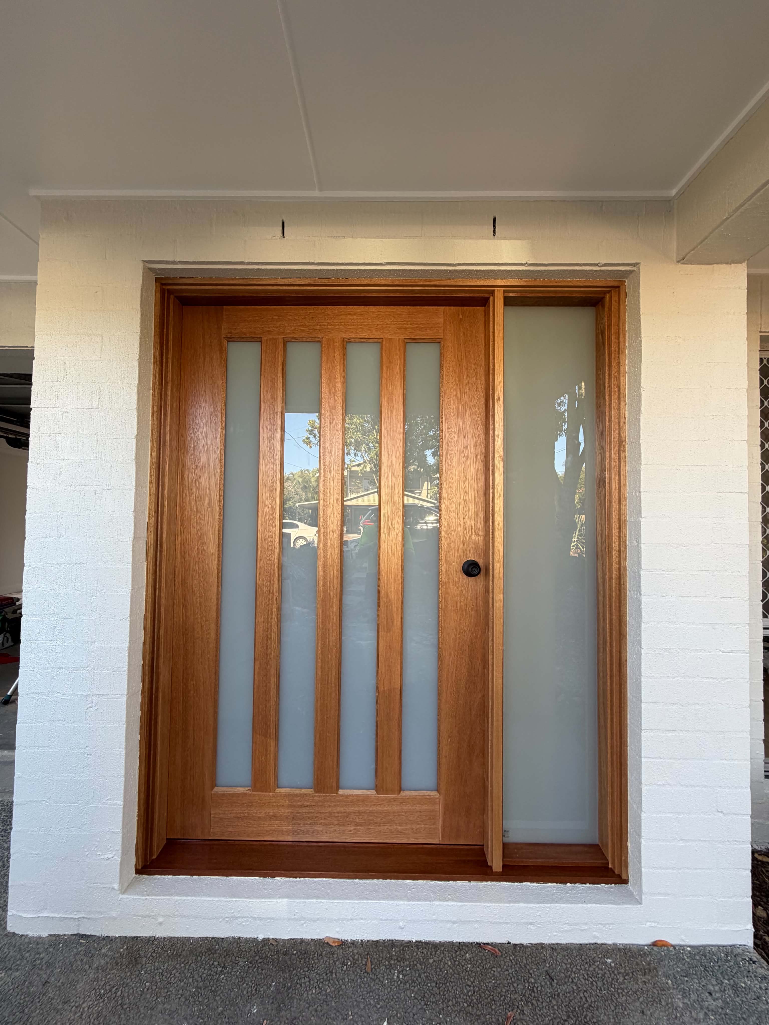 Natural timber entry door finish