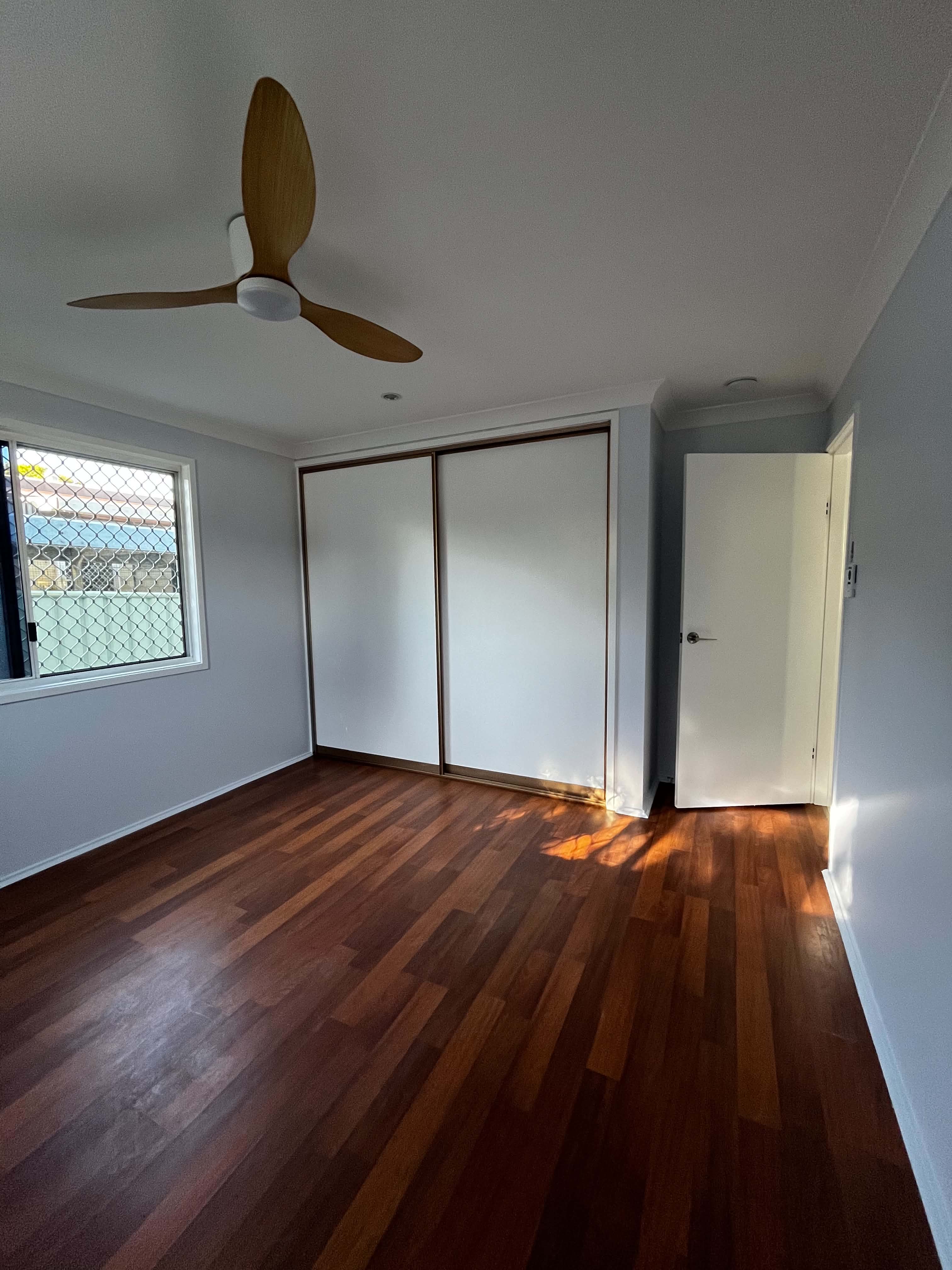 Fresh walls complementing polished timber floors